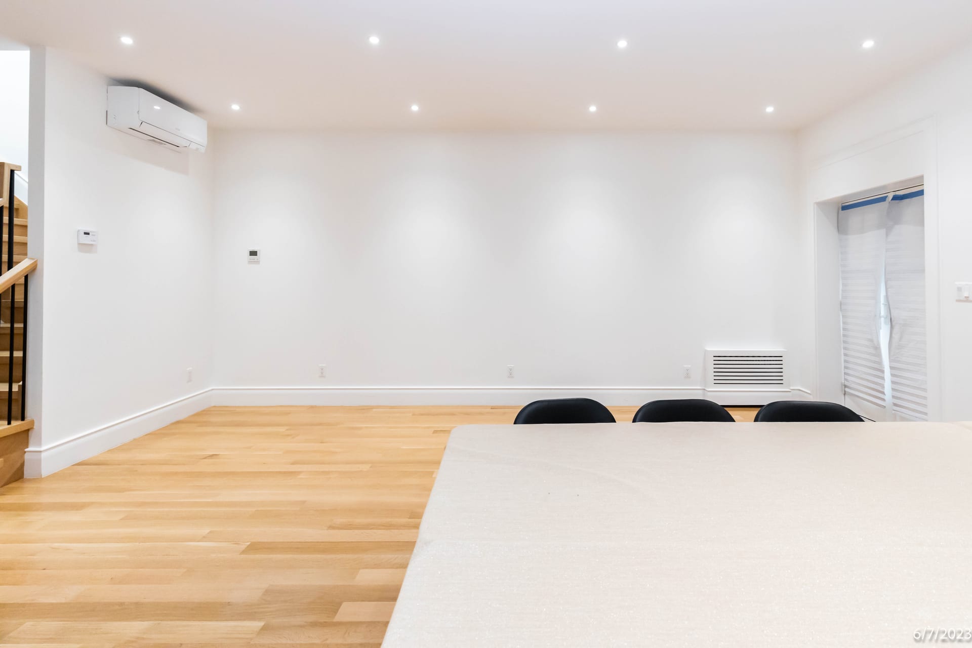 Interior living space and ceiling condition inspection during an OpenDoors360 pre-construction survey in New York City.